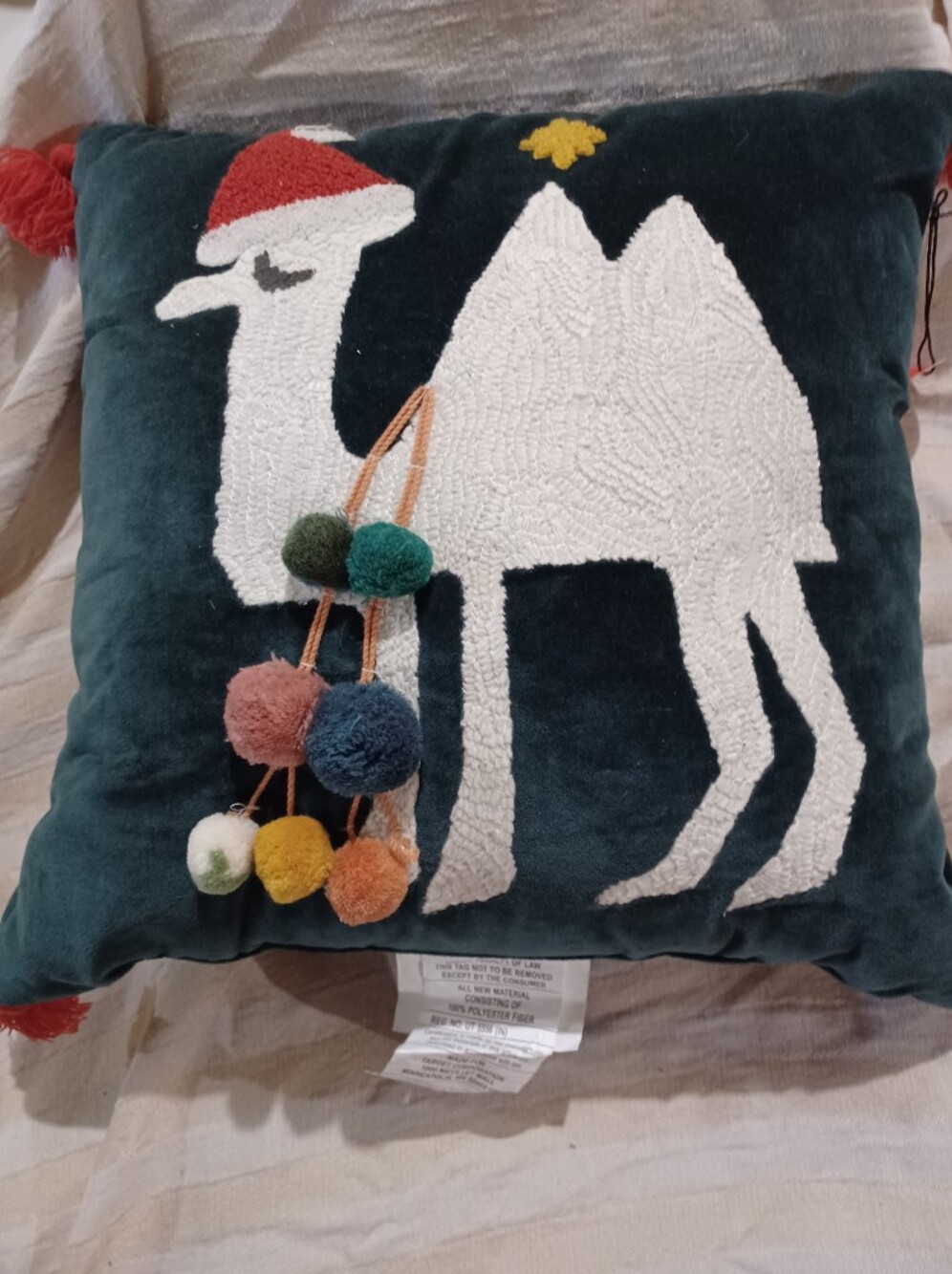 Teal Camel Accent Pillow with Multicolor Pom Poms